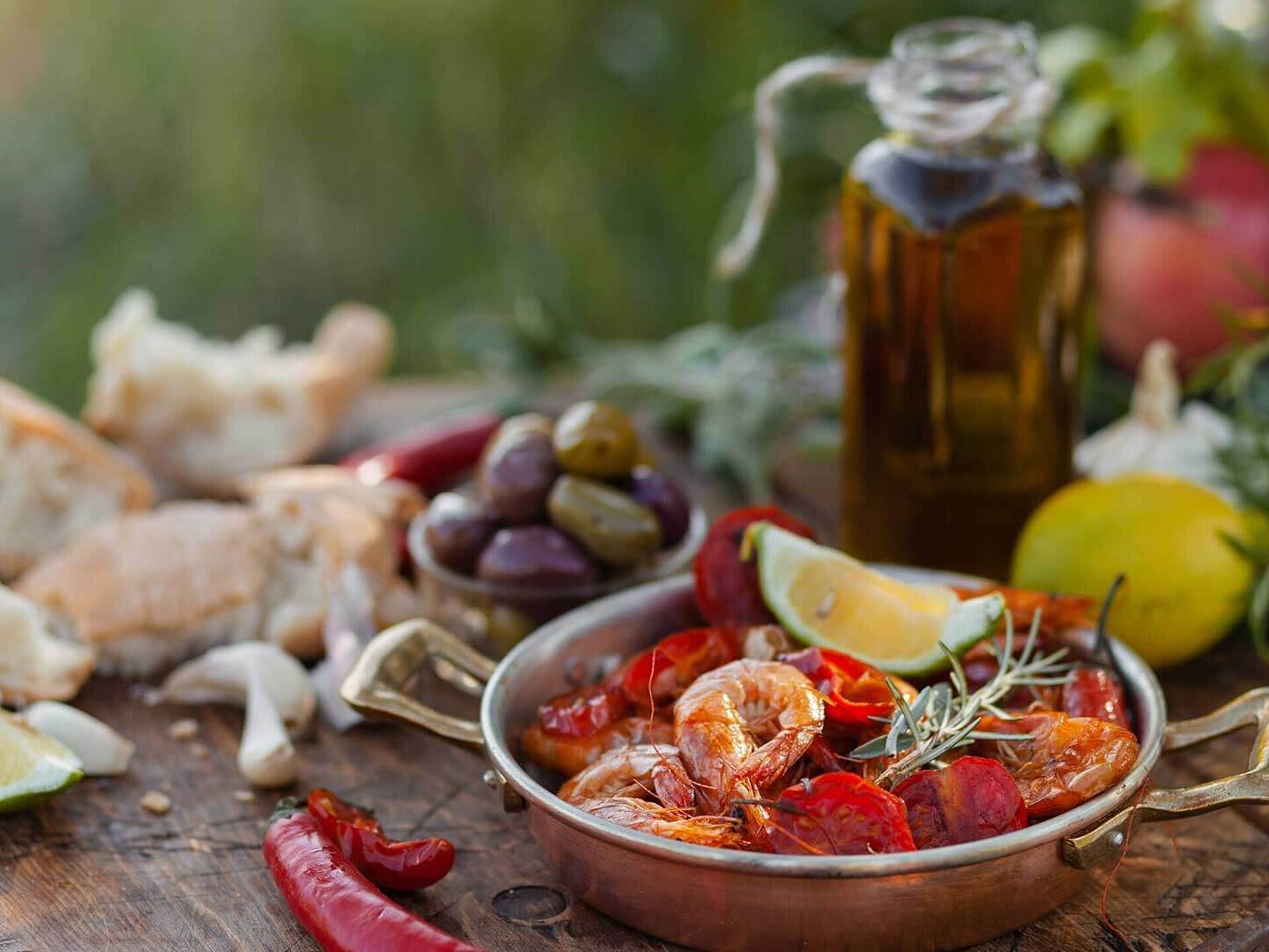 Food plate with prawns and olive oil