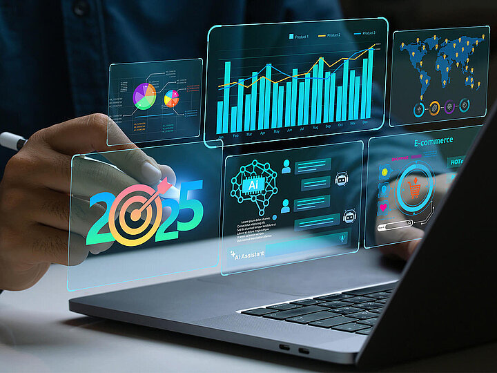 Picture showing a laptop and some modern 2025 data