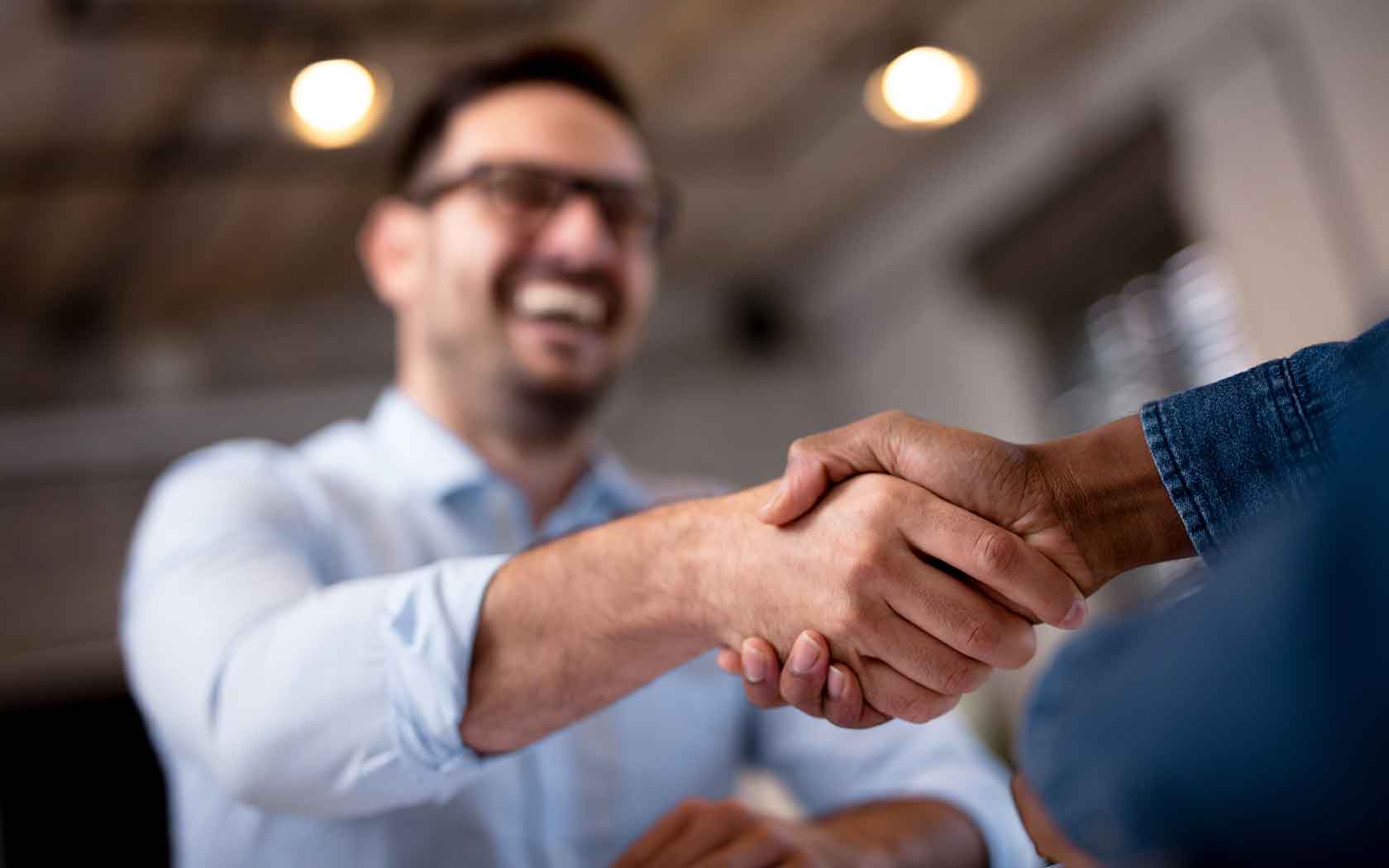 Friendly handshake between two men